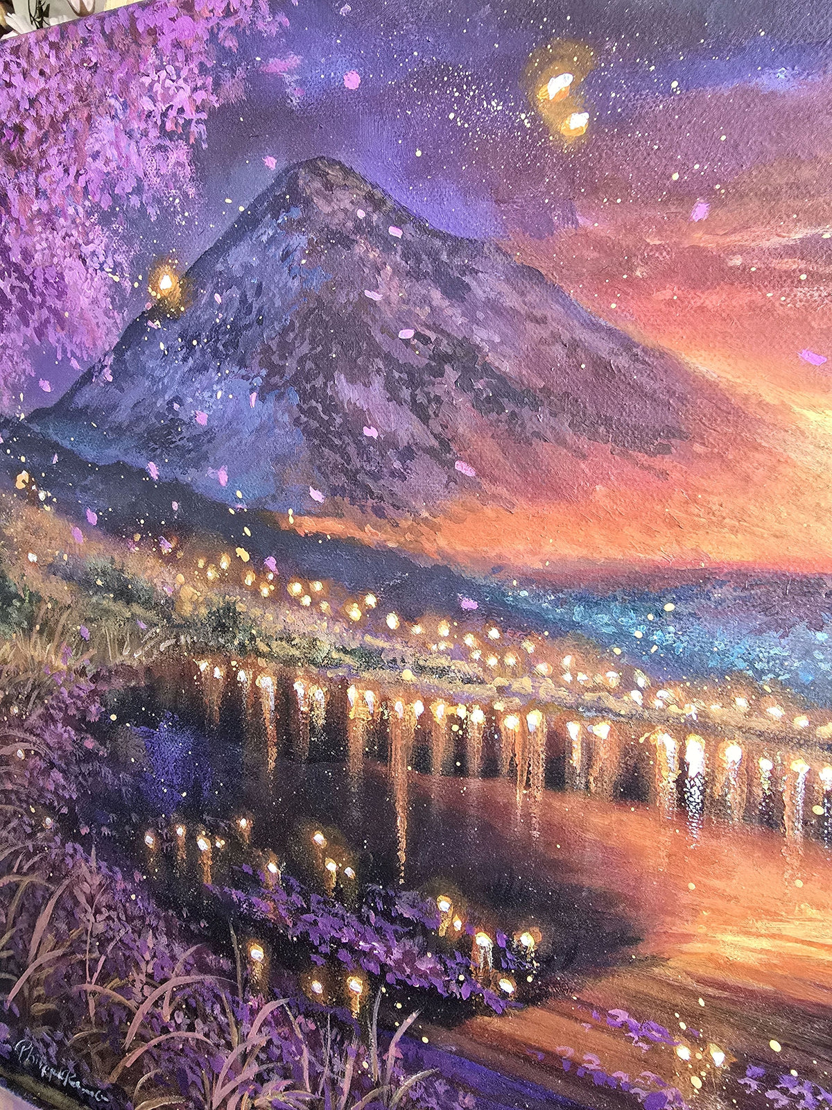 Fantasy Village Lights beneath Sunset Mountain